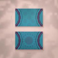 Presentable business card in turquoise color with Greek purple ornaments for your contacts. vector