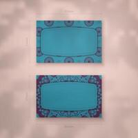 A presentable business card in turquoise color with a luxurious purple pattern for your contacts. vector