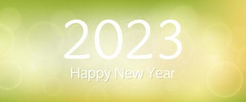 Happy new year 2023 incription on blurred background vector