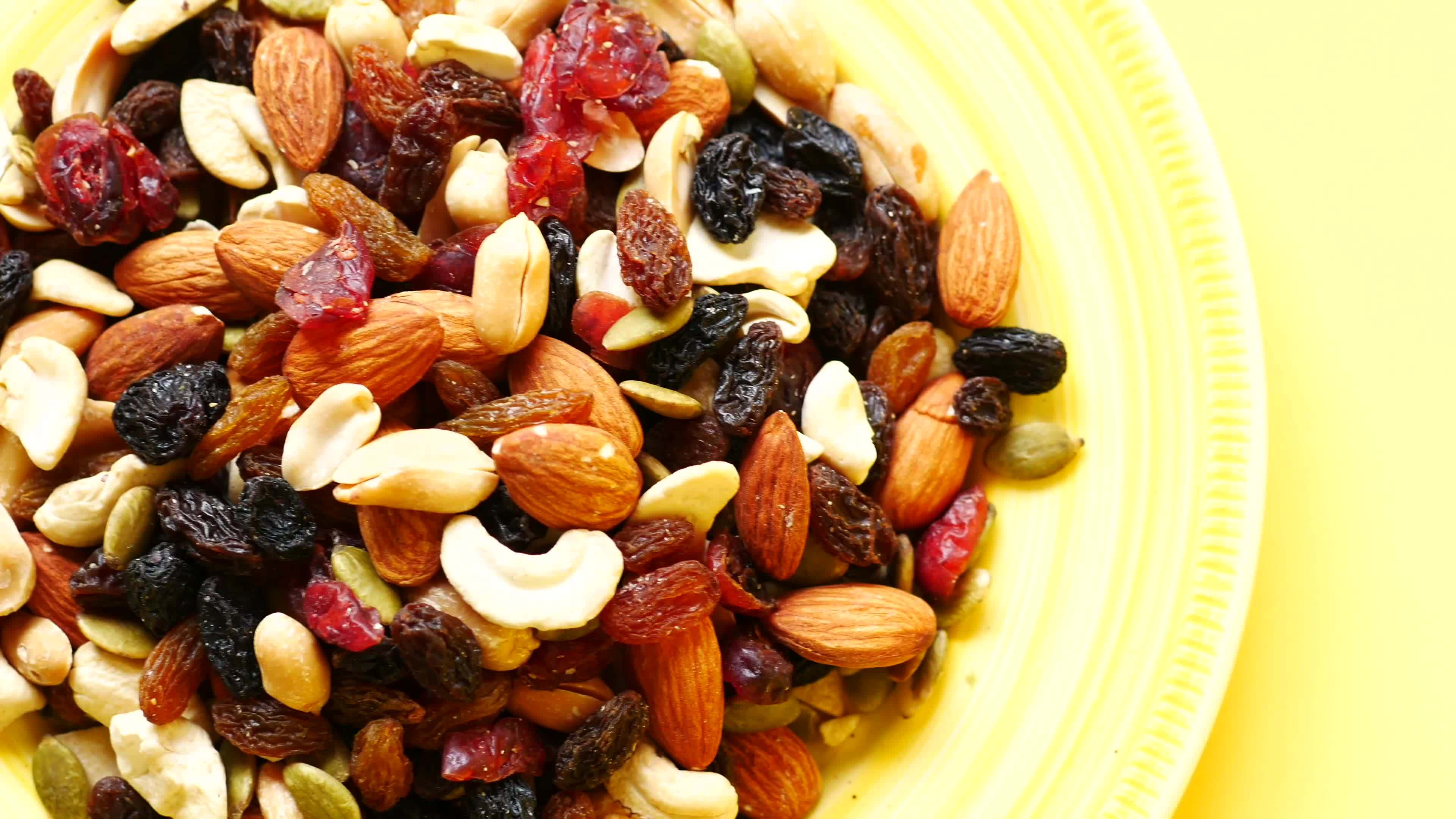 Trail mix in container 15808092 Stock Video at Vecteezy