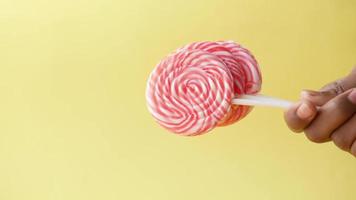 Red and white candy stripe lollipop video