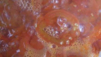 Close up of simmering tomatoes video