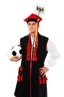 Polish man in a traditional outfit with football photo