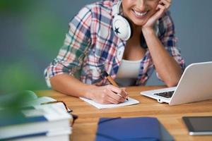 Female student learning at home photo