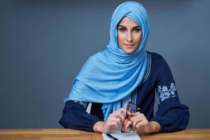 Muslim female student learning at home photo