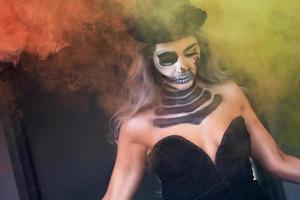 Spooky portrait of woman in halloween gotic makeup photo