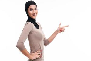 Muslim woman over white background photo