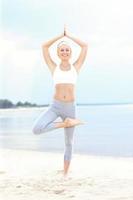 Woman doing yoga photo