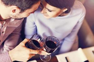 Romantic couple dating in restaurant photo