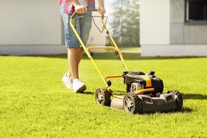 Man mowing the grass photo