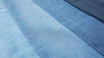 Denim fabric light to dark different shades abstract background photo