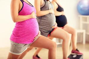 Group of pregnant women during fitness class photo