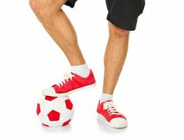 piernas de un futbolista foto