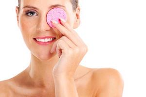 Portrait of a sensual woman removing makeup photo