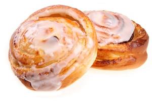 Sweet rolls on white background photo