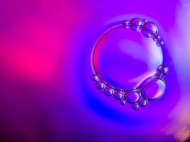 macro colorful soap bubbles gradient abstract background blue pink photo