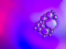 macro colorful soap bubbles gradient abstract background blue pink photo