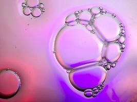 macro colorful soap bubbles gradient abstract background blue pink photo