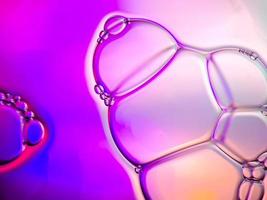 macro colorful soap bubbles gradient abstract background blue pink photo
