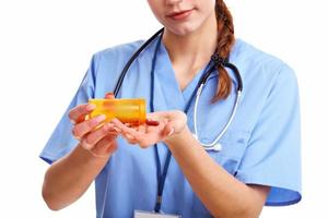 Woman doctor isolated over white background photo