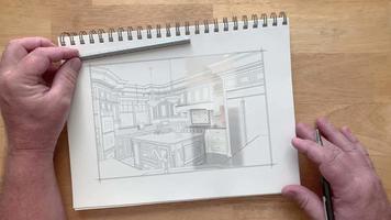 4k Custom Kitchen Photo Appears Over Artist Drawing On Pad of Paper video