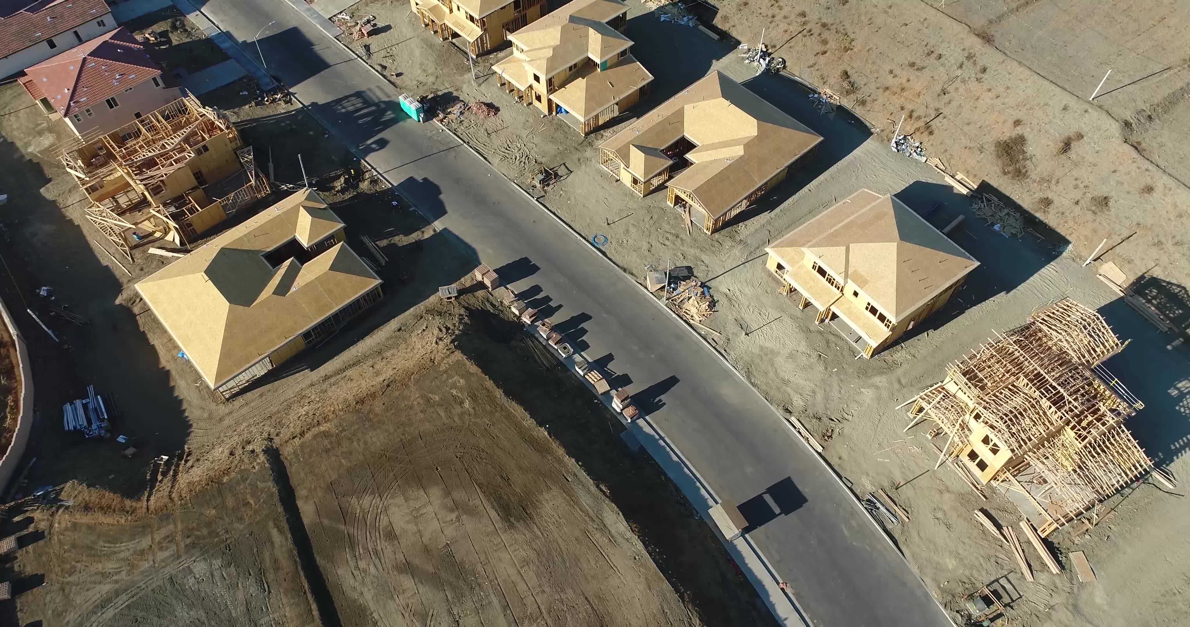 High Definition 4k Pan Up Over New and Developed Home Construction