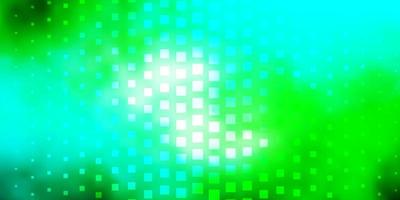 Light Blue, Green vector background in polygonal style.