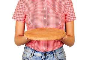 girl waiter holding a wooden empty board. perspective view isolated on white background. Template for your design photo