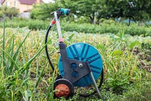 An image of a garden hose. Hose for irrigation photo