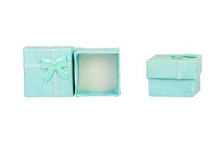 Opened empty blue gift box with a bow on a white background, isolated. photo