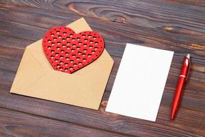 Envelope or letter, red hearts and notes. Valentines Day note with copyspace. Valentine day concept with copyspace photo