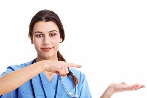 Woman doctor isolated over white background photo