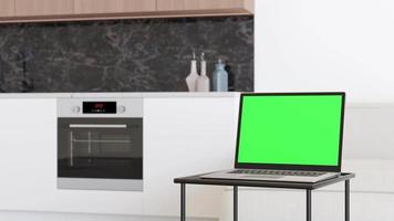 laptop com tela verde em branco, de pé na mesa em casa. simulação de computador com chroma key. copie o espaço para vídeo, aplicativo, jogo, apresentação do site. tela de laptop vazia. interior moderno. animação 3D. video