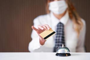 Receptionist working in a hotel photo