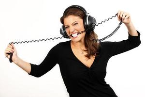 Girl biting a wire photo