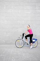 Young girl on a bike photo