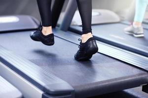 Legs on treadmill photo