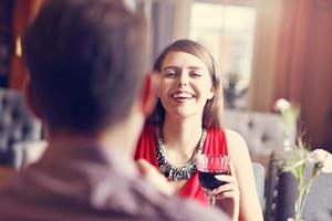 Romantic couple dating in restaurant photo