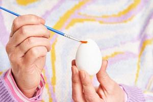 Studio shots of woman over yellow background easter style photo