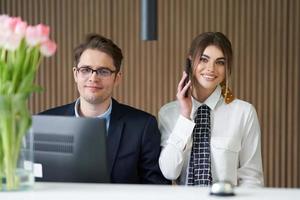 Receptionist working in a hotel photo