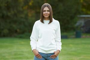 Young woman in white blouse photo