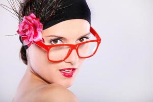 Woman in red glasses photo