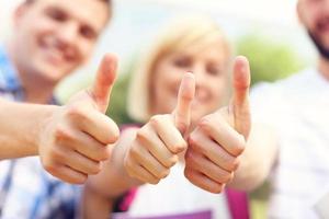 Students showing ok sign photo