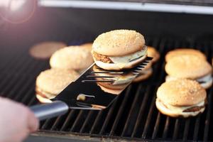 Cheeseburgers on the grill photo