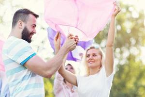 Group of friends floating chinese lanterns photo