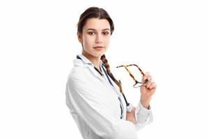 Woman doctor isolated over white background photo