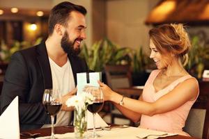 Romantic couple dating in restaurant photo