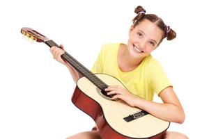 Teenager and guitar photo