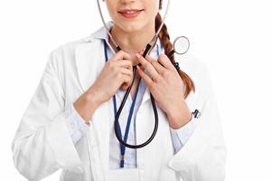 Woman doctor isolated over white background photo