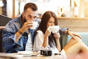 Romantic couple dating in cafe photo